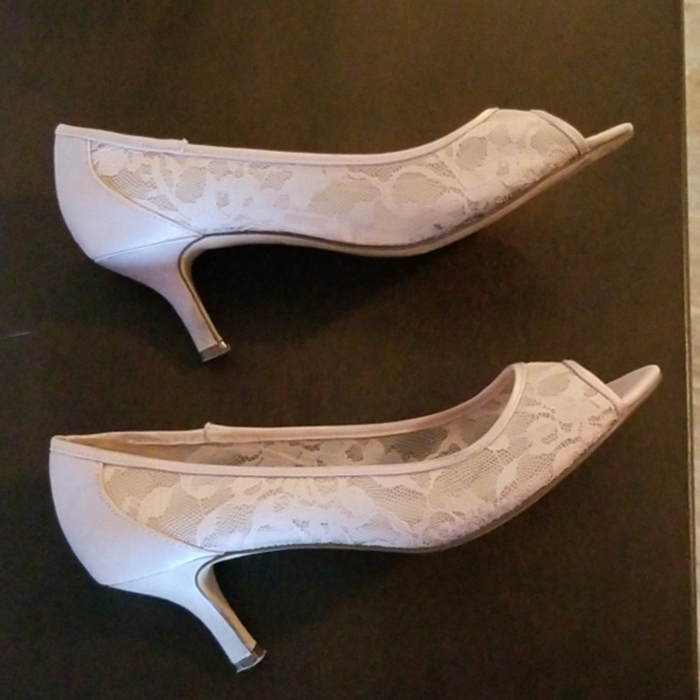 Peep toe lace pumps
